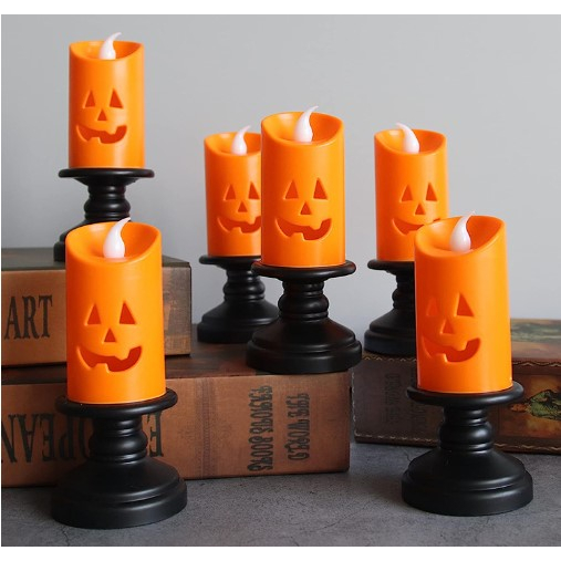 Dica de decoração: velas de abóbora laranja para festa de Halloween em casa